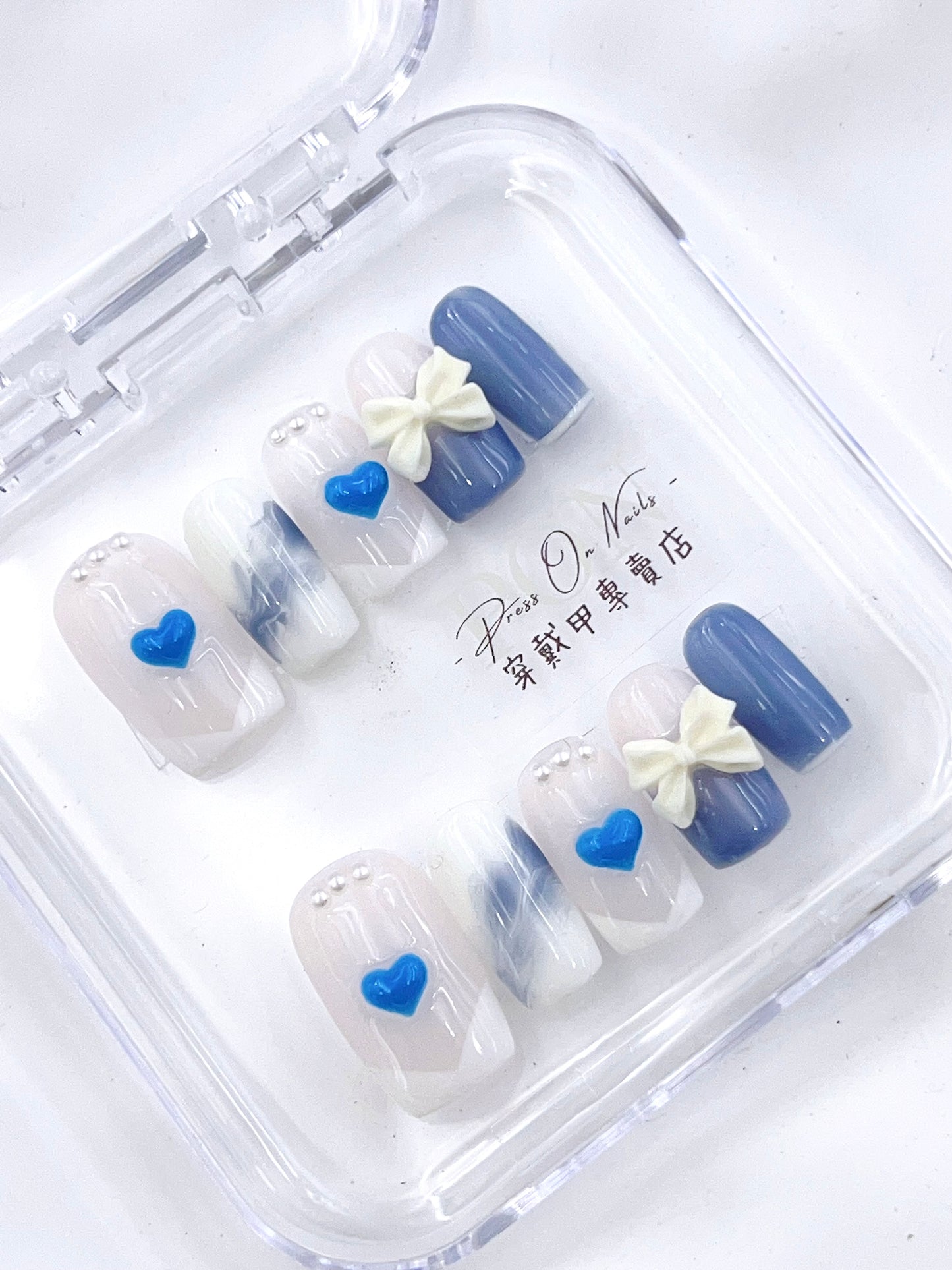 P101 Sky blue and white bow French press on nails