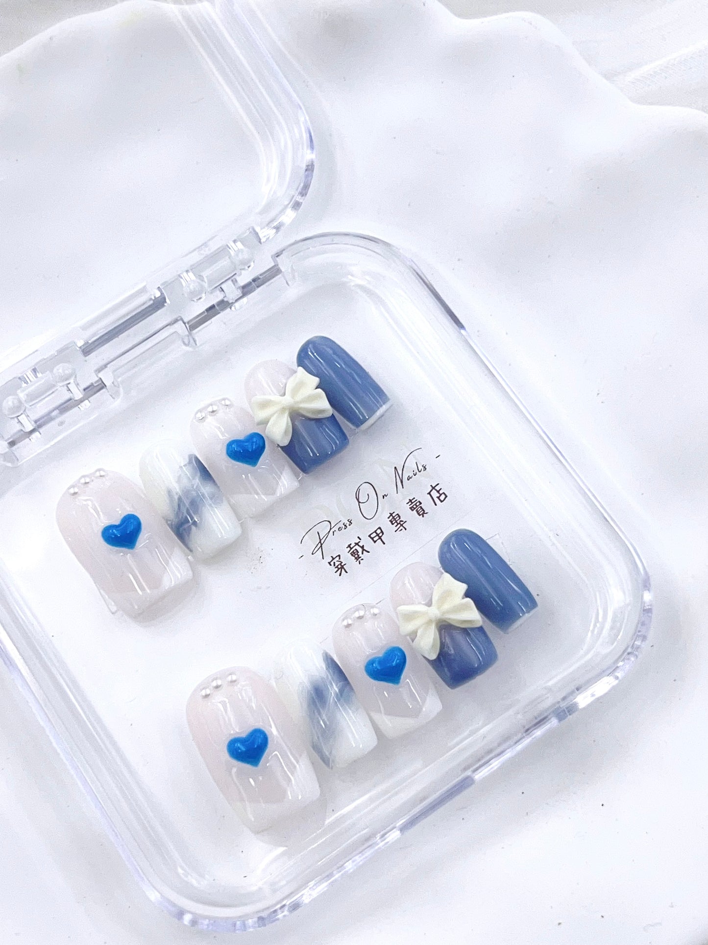 P101 Sky blue and white bow French press on nails